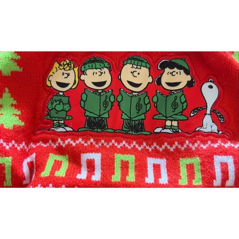Peanuts caroling laplander hat green pom pom braided tassels NWOT